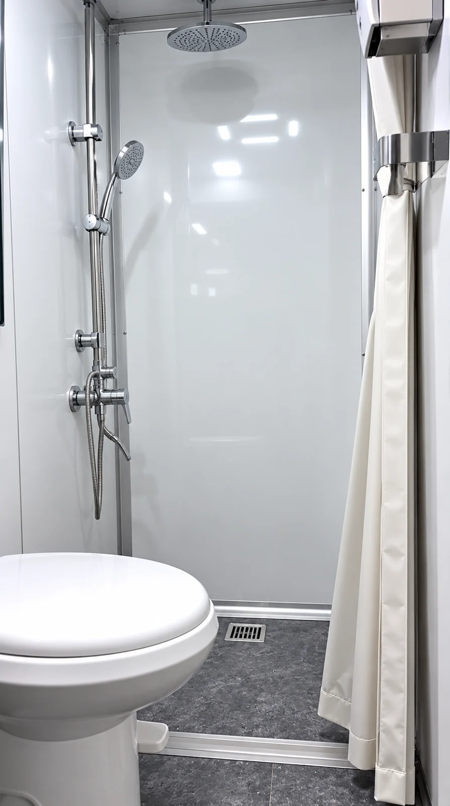 Shower and toilet within one compartment of a combination welfare trailer